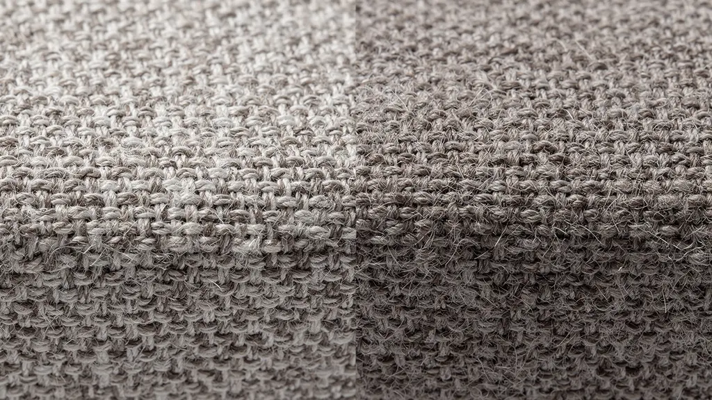Detalle macro de tejido de sofá con textura visible mostrando la resistencia del material